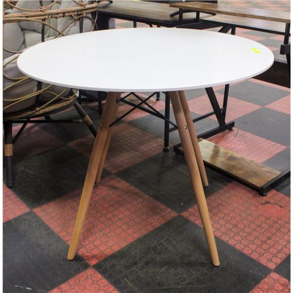 WHITE ROUND IKEA TABLE H-30" DIAMETER-35.5"