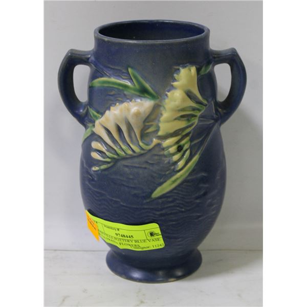 ROSEVILLE POTTERY BLUE VASE WITH FRASIA FLOWERS.