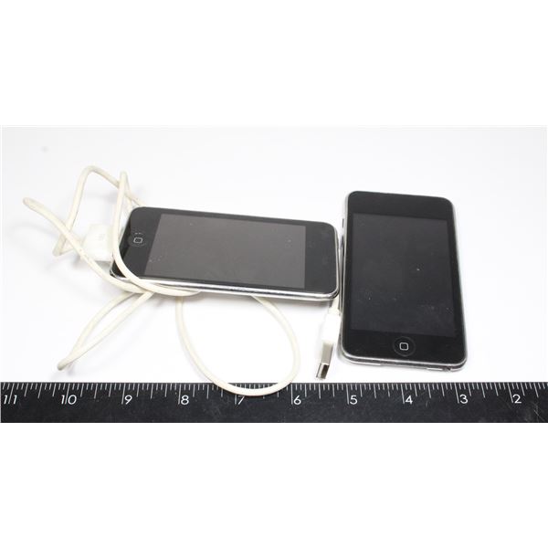 LOT OF TWO APPLE IPODS. ONE TURNS ON BUT SHOWS IT