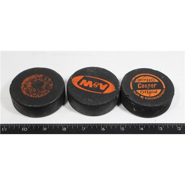 LOT OF 3 HOCKEY PUCKS INCLUDING A&W HOCKEY PUCK