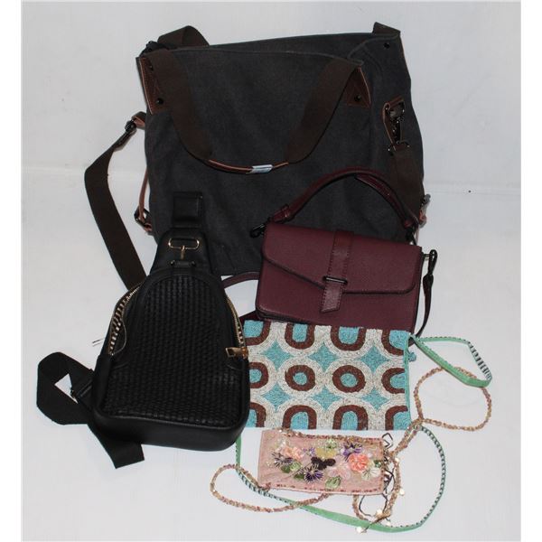 TOTE BAG FULL OF VARIOUS PURSES AND BAGS