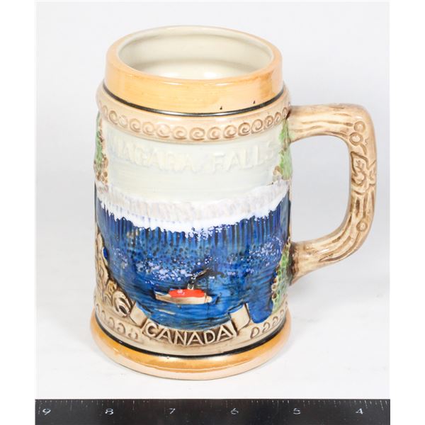1950'S GERMAN STYLE RELIEF STEIN OF RCMP