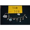 Image 1 : 1950'S STERLING CHARM BRACELET W/7 CHARMS (VERY SCARCE MATON LURLINE CHARM)