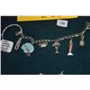 Image 2 : 1950'S STERLING CHARM BRACELET W/7 CHARMS (VERY SCARCE MATON LURLINE CHARM)