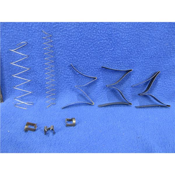 3 Cooey Model 60 Extractors and 5 Unknown Magazine Springs