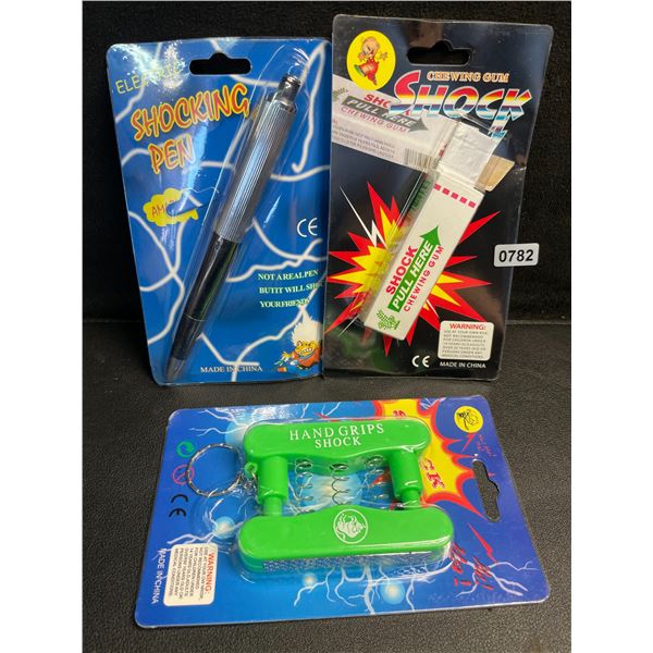 Lot of 3 Assorted Funny Prank Devices - Shock Pen, Shock Chewing Gum, & Hand Grip Shock - New