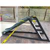 Image 1 : Green plastic playground slide mounted on a black Frame