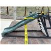 Image 2 : Green plastic playground slide mounted on a black Frame