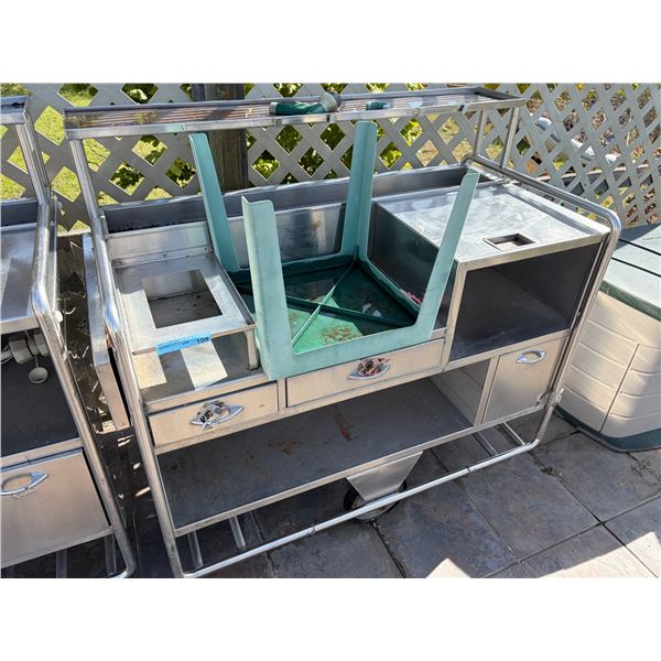 stainless steel commercial utility station and a stool