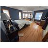 Image 1 : large bedroom lot includes the wood bed frame, nightstands, seating, dresser, and decor items