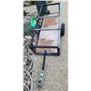 Image 3 : Single-axle utility trailer with a black metal frame