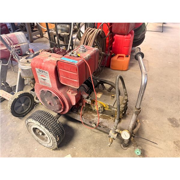 Gas pressure washer equipped with a red Briggs & Stratton 531cc engine