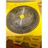 Image 3 : Group of Circular Saw Blades and Safety Jacket