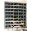 Image 1 : Wall-mounted wooden pigeonhole storage bin filled with an assortment of bolts, nuts, washers, etc