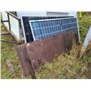 Image 1 : Group of Solar Panels and a sheet of wood