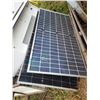 Image 2 : Group of Solar Panels and a sheet of wood