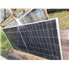 Image 3 : Group of Solar Panels and a sheet of wood