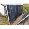 Image 4 : Group of Solar Panels and a sheet of wood