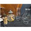 Image 2 : 4 Oil Lamps With 4 Assorted Glass Chimneys
