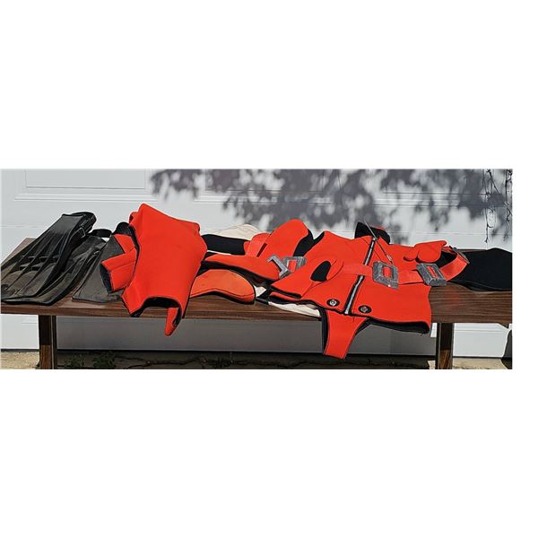 Dolphin Fins and Red Neoprene Diving Suits with Accessories