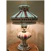 Image 1 : Decorative Ceramic Oil Lamp with Red Pattern and Metal Hardware