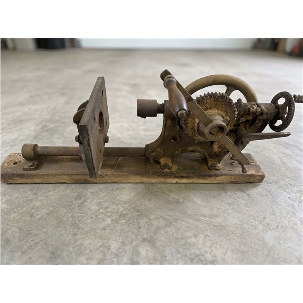 Cast Iron Hand-Crank Gear-Driven Machine Part on Wooden Base