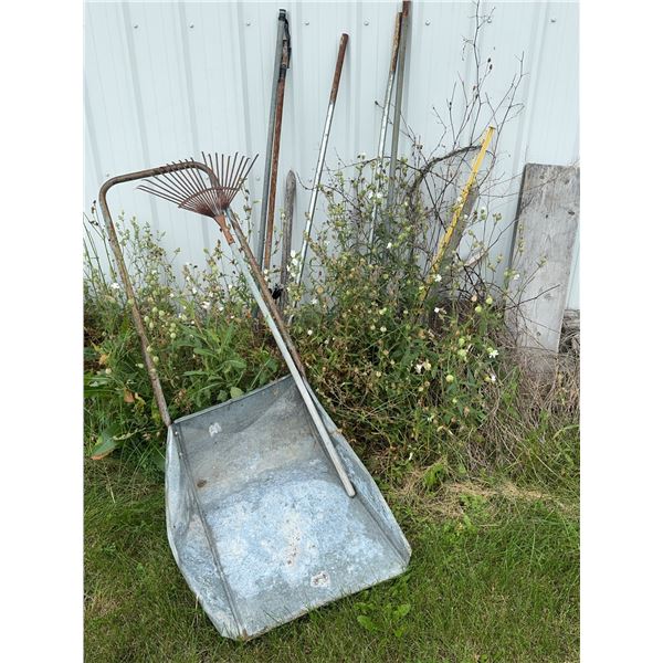 Garden Tools Including Metal Wheelbarrow and Rake