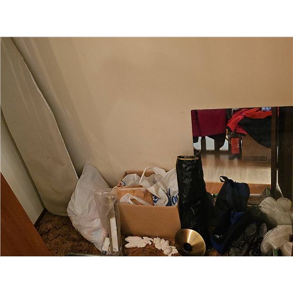 Household Items Including Shoes, Mirror, Bags, and Ironing Board