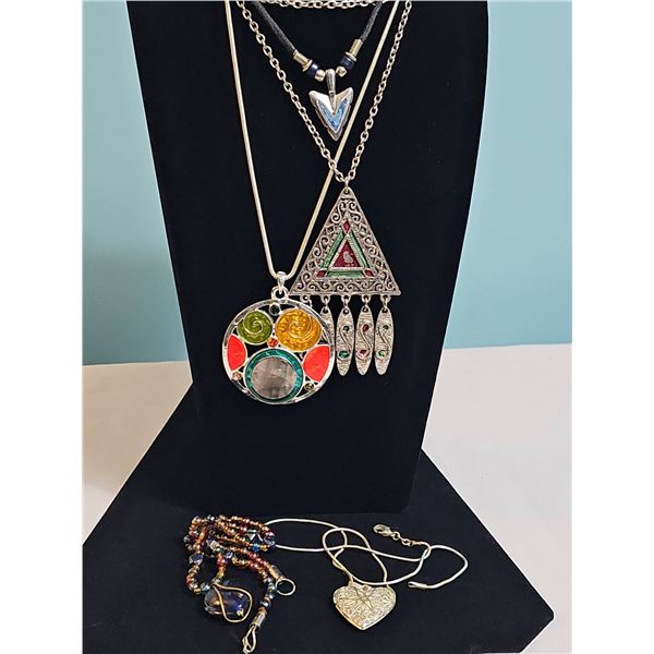 Costume Necklaces Including Beaded, Heart Locket, Arrow, and Multicolour Pendants