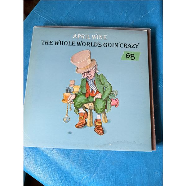 APRIL WINE THE WHOLE WORLD'S GOIN' CRAZY VINYL RECORD