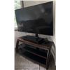 Image 1 : Hisense Flat Screen TV With Wood and Glass Media Stand