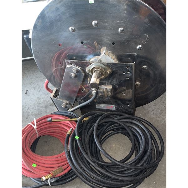 Industrial Metal Hose Reel With Red and Black Hoses