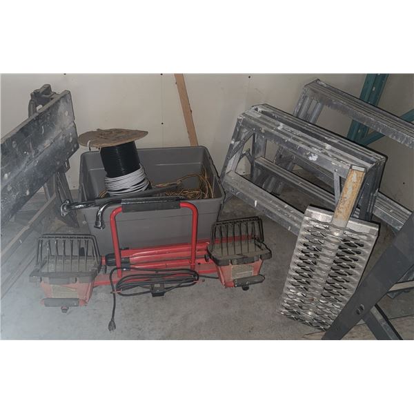 Construction Equipment Including LED Work Lights, Workbench, Ladders, and Electrical Supplies