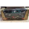 Image 1 : Burago- 1961 Jaguar E - 1/18 scale
