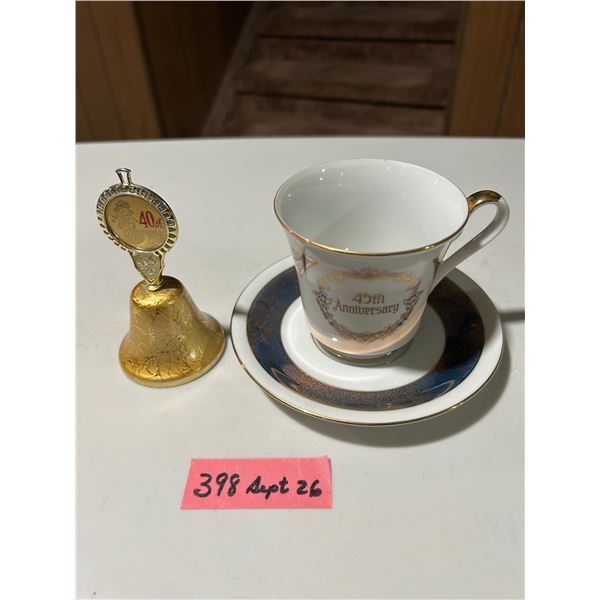 40th Anniversary metal bell and 45th Anniversary teacup and saucer set