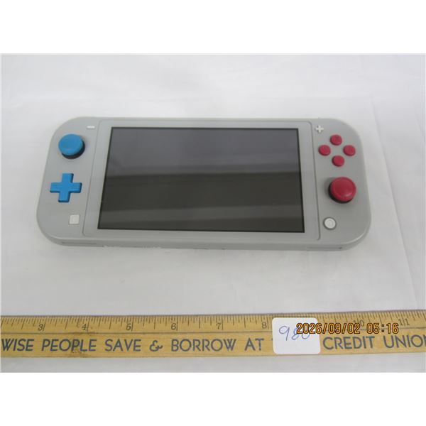 980. Nintendo Switch Working No Charger Cord