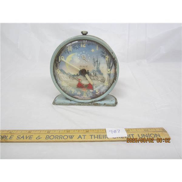 987. Antique Pixie Character Clock