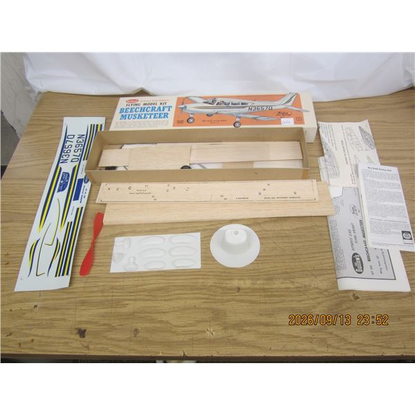 1064. Guillow’s Authentic Beach Craft Musketeer Airplane Flying Model Kit Unbuilt with Orig