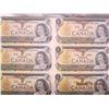 Image 2 : 1101. Vintage Laminated Uncut Canadian Sheet of Dollar of 1 Dollar Bills 1973 all Serial Numbers are