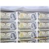 Image 4 : 1101. Vintage Laminated Uncut Canadian Sheet of Dollar of 1 Dollar Bills 1973 all Serial Numbers are