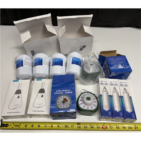 Collection of household items, including refrigerator water filters, portable pill boxes, visual cou