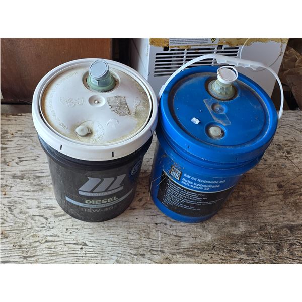 Bucket of 15w40 oil - 3/4 full and bucket of hydraulic oil- 1/4 full
