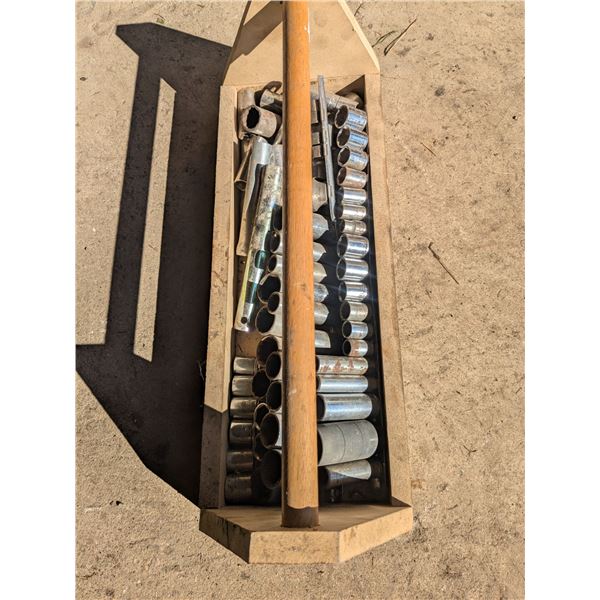 Wood tool box with assorted sockets