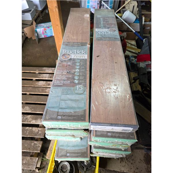 12 boxes of new laminate flooring- 7mm- acorn oak