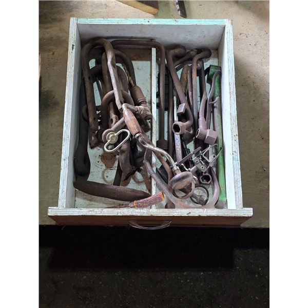 Drawer full of antique tools, hand drill