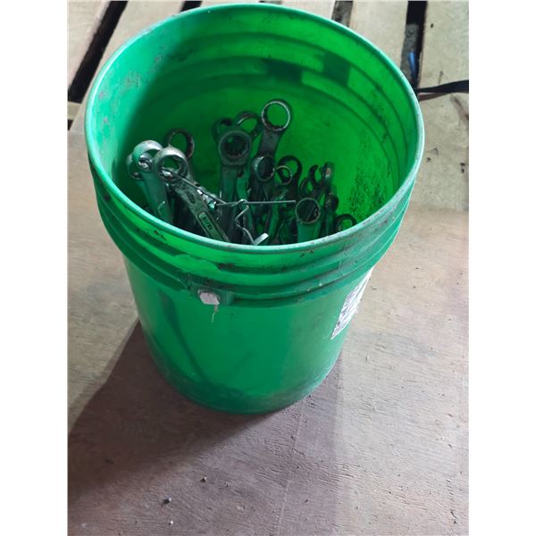 Bucket of various wrenches