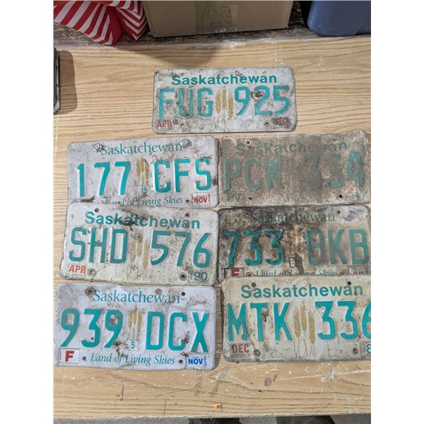 7 mixed sask license plates