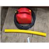Image 1 : plastic tube, gas can, bike tires
