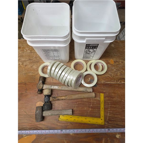 Lot of tools, hammers, tape, bucket