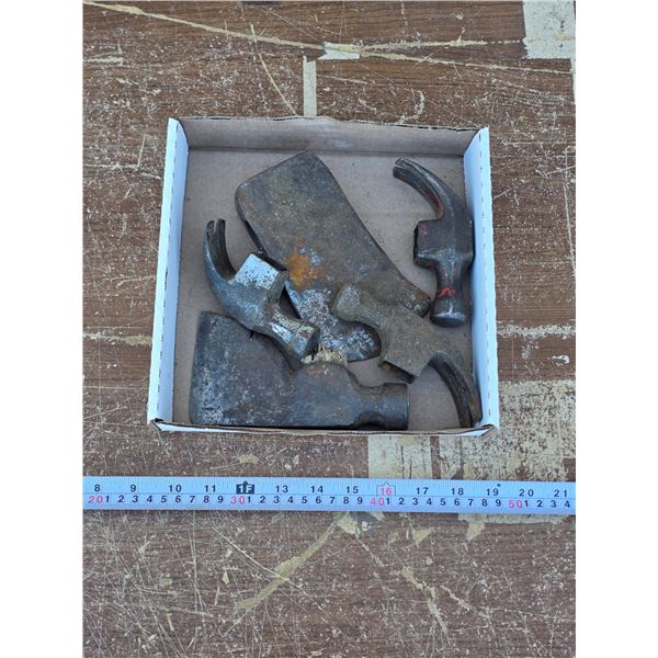 Claw hammer heads and axe heads